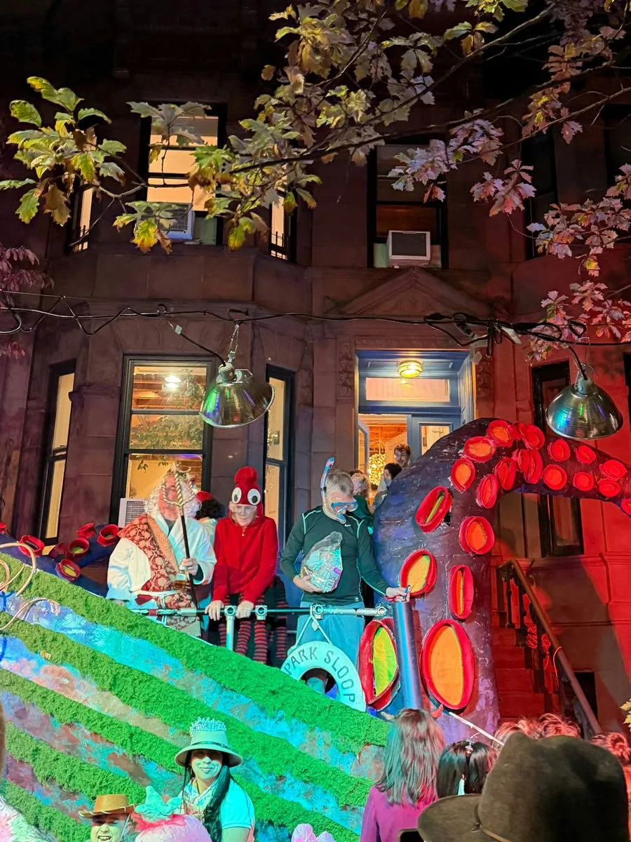 Pirate ship house decoration, crew in costume at the rail