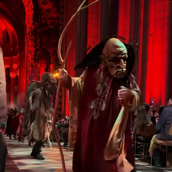 Costumed performer in the cathedral nave during the Halloween Extravaganza